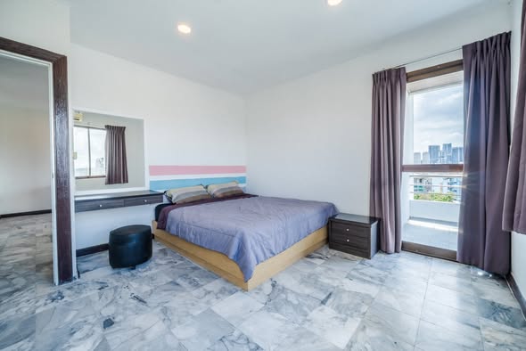 bedroom of T.I.T. Tower Apartment Service