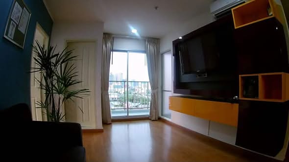 bedroom and living room of U-Delight Jatujak Station condo.
