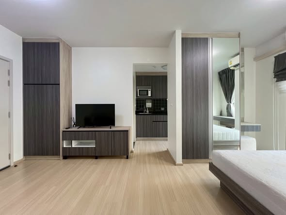 bedroom and room interior of UNiO Sukhumvit 72