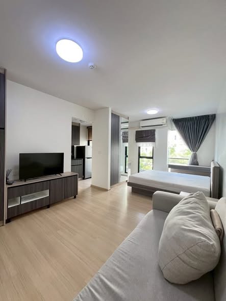 living room and bedroom of UNiO Sukhumvit 72