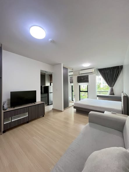 living room and bedroom of Unio Sukhumvit 72 Phase 2 Building A