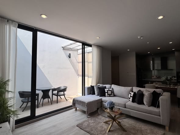 living room and room interior of VIA 31 Condo
