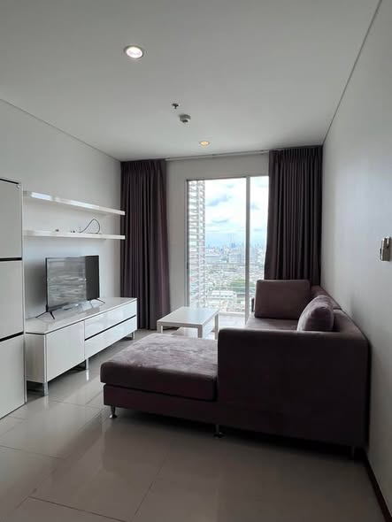 living room and bedroom of Villa Sathon Condominium
