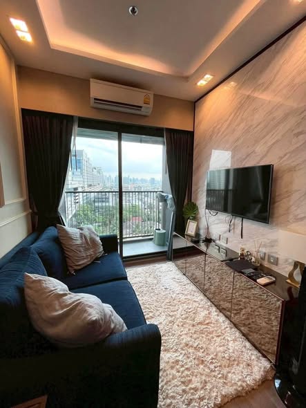 bedroom and living room of Whizdom Avenue Ratchada-Ladprao