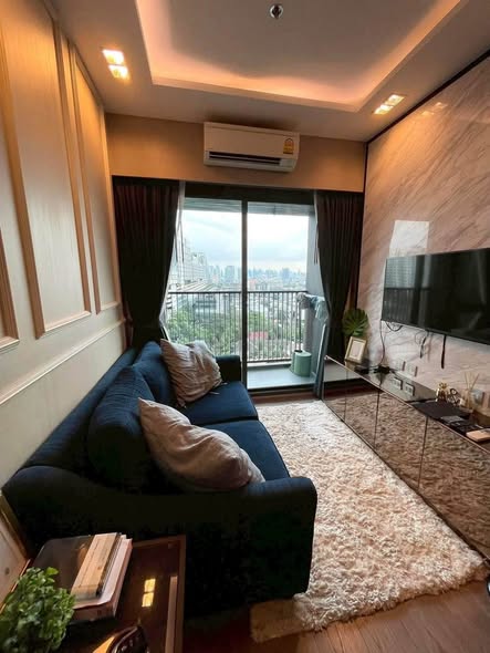 living room and bedroom of Whizdom Avenue Ratchada-Ladprao