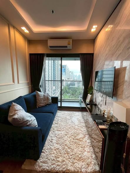 living room and bedroom of Whizdom Avenue Ratchada-Ladprao
