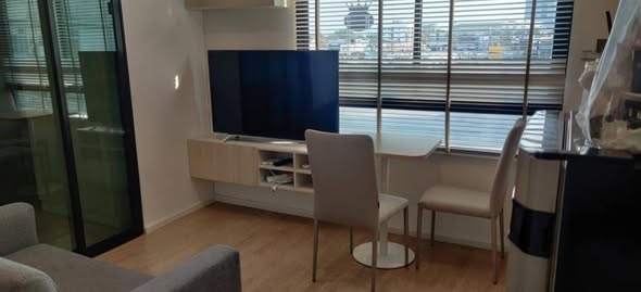 living room and room interior of Wynn Condo Chokchai 4