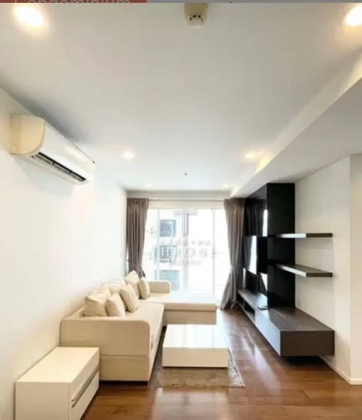 living room and bedroom of 15 Sukhumvit Residences