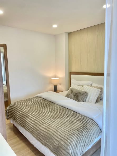 bedroom of Airport Home Condo