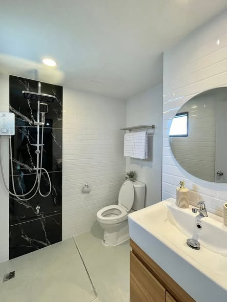 room interior and bathroom of Airport Home Condo
