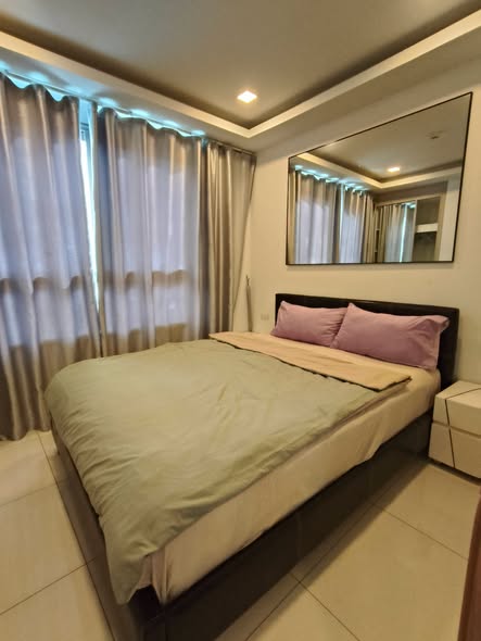 bedroom of Arcadia Beach Resort Condominium