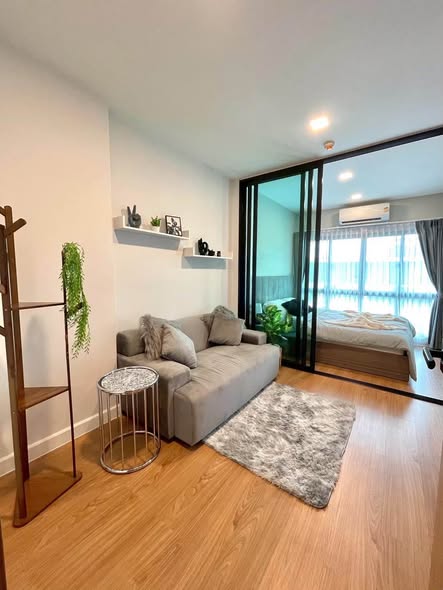 bedroom and living room of Arise Condo At Mahidol