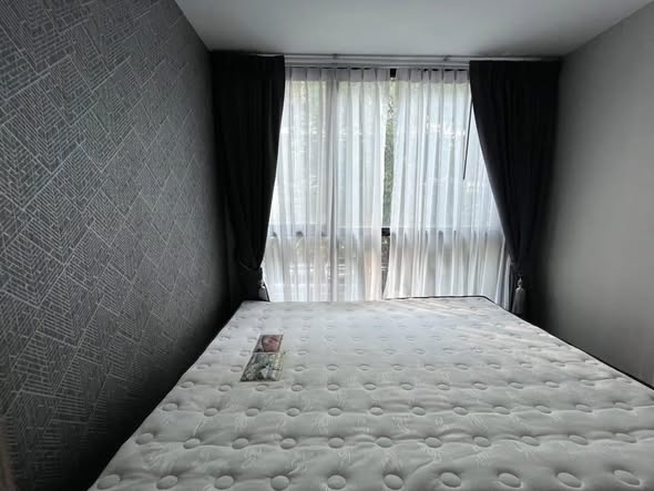 bedroom of Atmoz รัชดา-ห้วยขวาง คอนโด