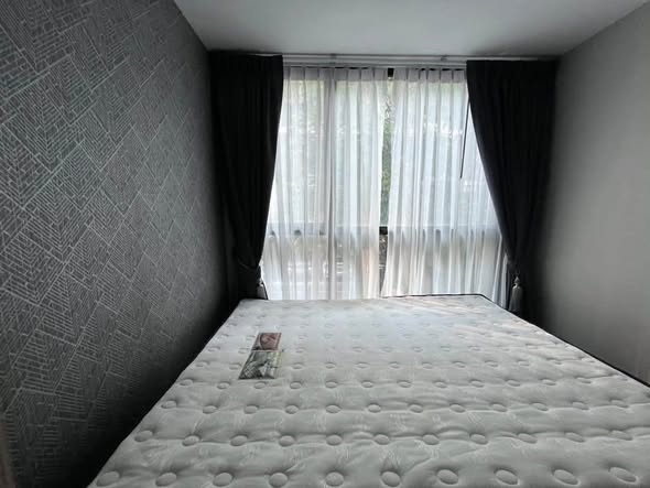 bedroom of Atmoz รัชดา-ห้วยขวาง คอนโด