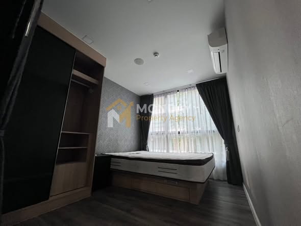 bedroom of Atmoz รัชดา-ห้วยขวาง คอนโด