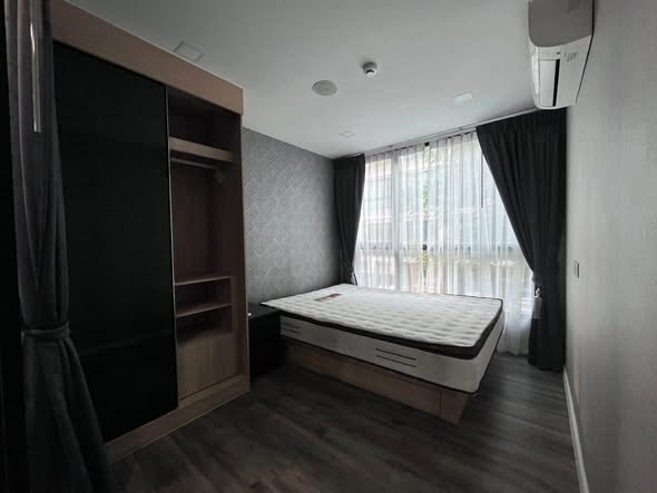 bedroom of Atmoz รัชดา-ห้วยขวาง คอนโด