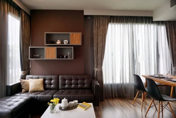 bedroom and living room of CEIL By Sansiri