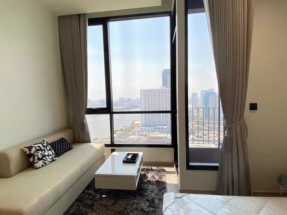 living room and bedroom of Chapter Charoenkrung-Riverside