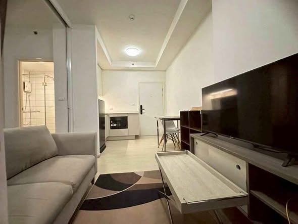 living room and bedroom of Chapter One Eco Ratchada-HuaiKhwang