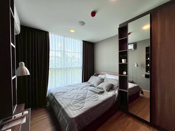 bedroom of CONDO THE CUBE LOFT NAUNCHAN