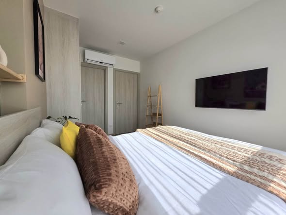 bedroom of dcondo Reef Phuket