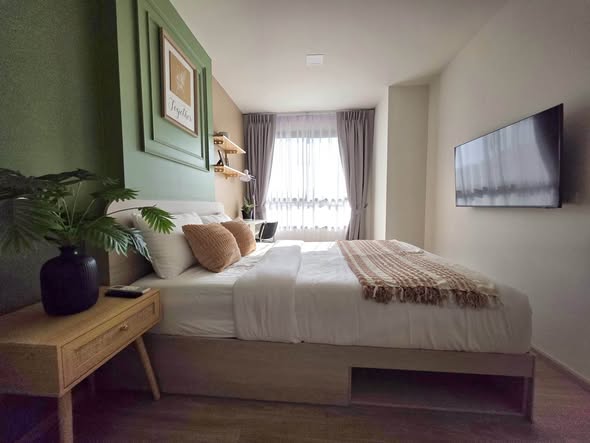 bedroom of dcondo Reef Phuket