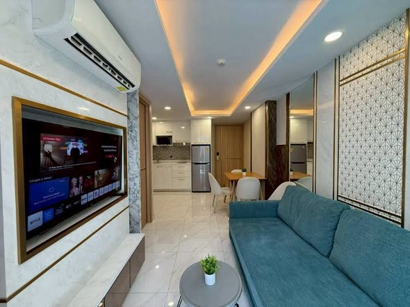 living room and bedroom of Dusit Grand Park