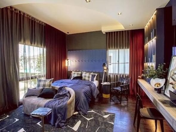 bedroom and living room of Grand Bangkok Boulevard Sukhumvit – Srinakarin