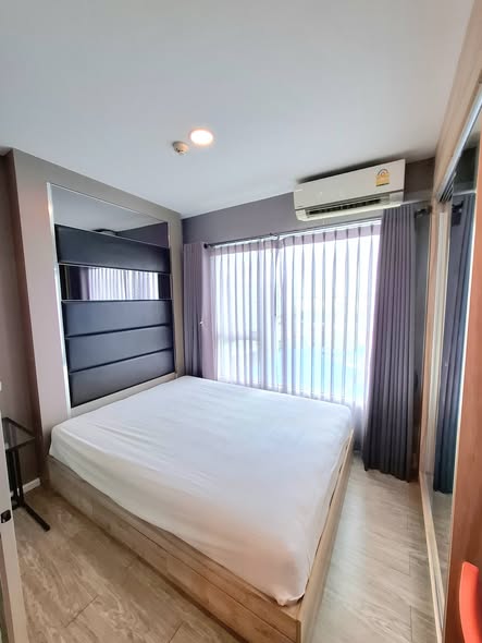 bedroom of Happy Condo Don Mueang The Terminal