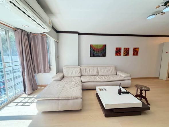 bedroom and living room of Hillside Condo 3