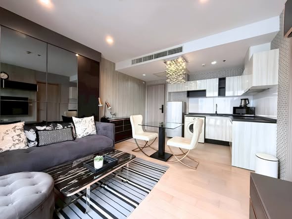 living room and kitchen of HQ by Sansiri