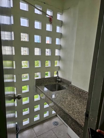 room interior and bathroom of i-House Laguna Garden RCA – Building A (Blue)