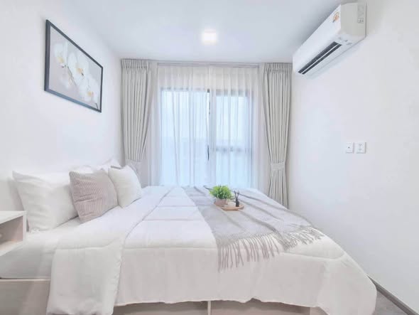 bedroom of Kave Wonderland Sales Gallery