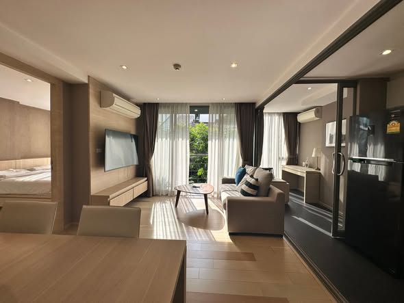 living room and bedroom of Klass Silom Condo