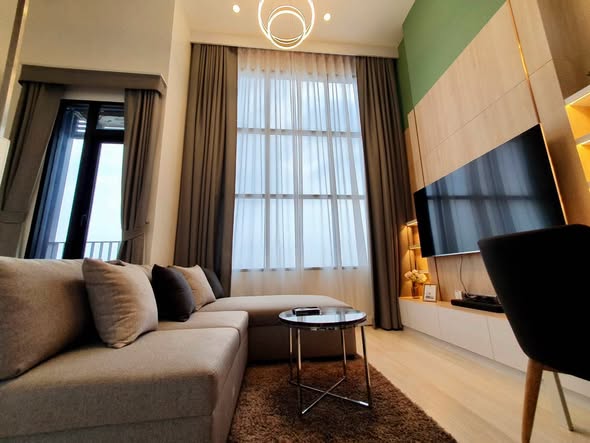 living room and bedroom of KnightsBridge Prime Sathon