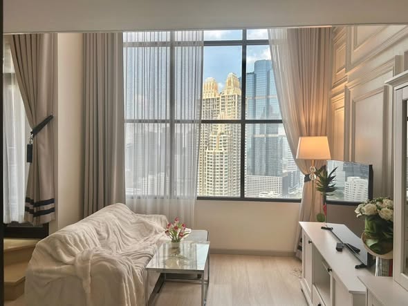 living room and bedroom of KnightsBridge Prime Sathon