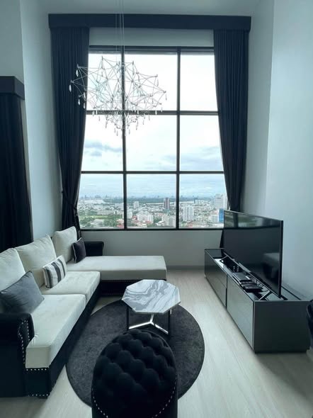 living room and bedroom of KnightsBridge Prime Sathon