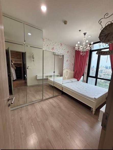 bedroom and room interior of KPN The Capital Condo