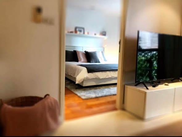 bedroom and room interior of LE NICE CONDO