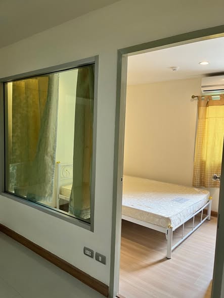 bedroom and room interior of Le Rich Condominium