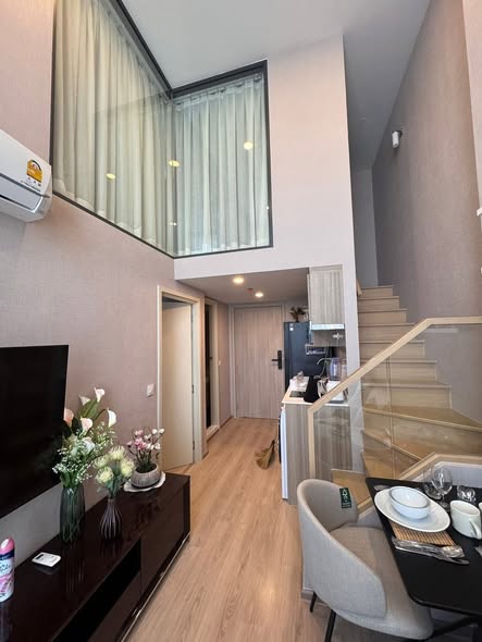 living room and bathroom of Life Rama 4 – Asoke
