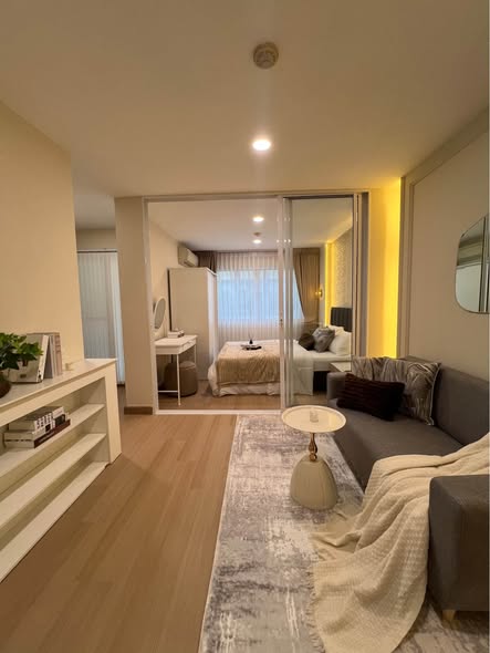 living room and bedroom of Lumpini Condo Town Bodindecha-Ramkhamhaeng