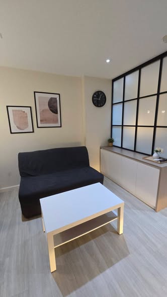 living room and bedroom of Lumpini Suite Sukhumvit 41