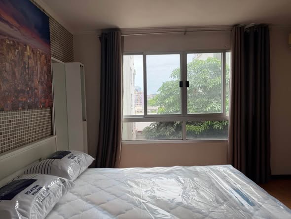 bedroom of Lumpini Ville Cultural Center