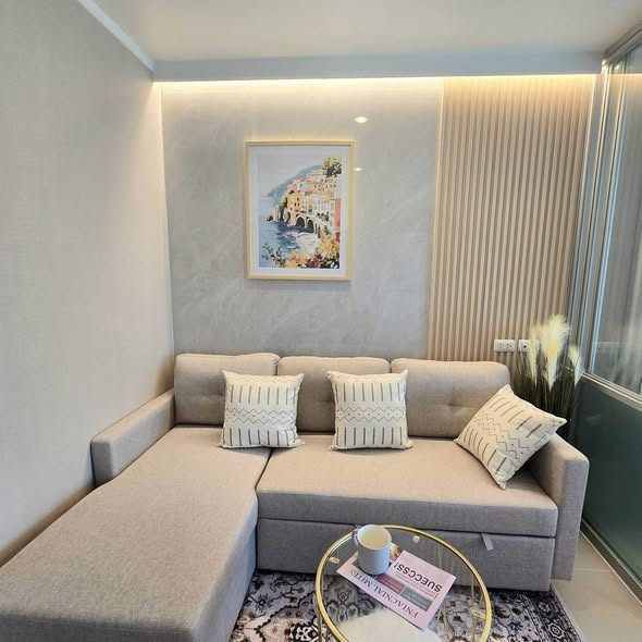 living room and bathroom of Lumpini Ville Naklua – Wong Amat BuildingC