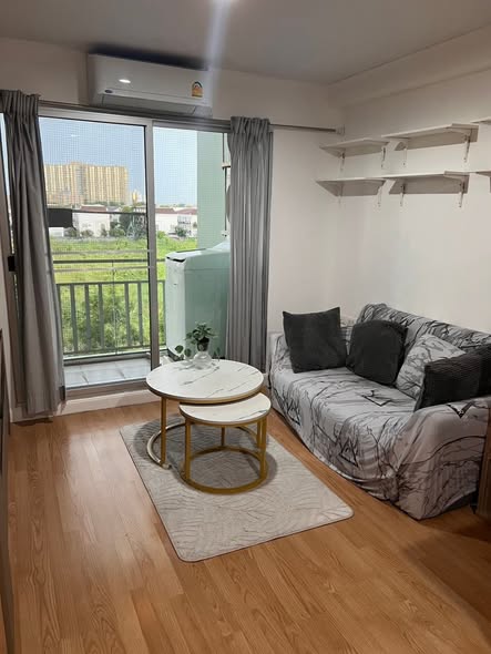 bedroom and living room of Lumpini Ville Ramkhamhaeng 26