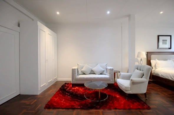 bedroom and living room of LUXURY HOME VILLAS LTD