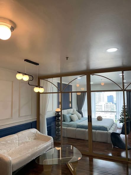 living room and bedroom of Luxury Suite @ BTS Nana