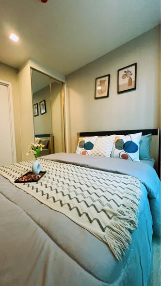 bedroom of Metro Luxe Riverfront Rattanathibet