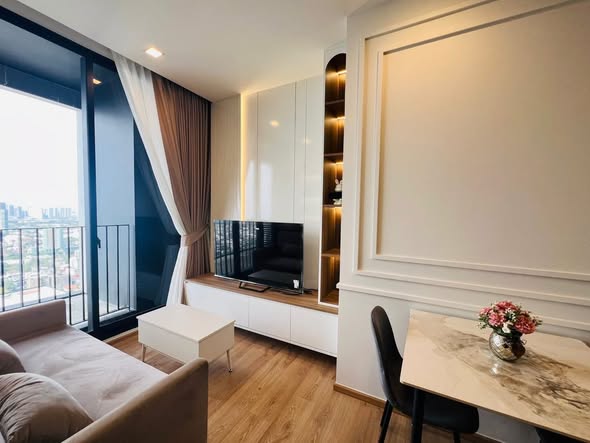 living room and bedroom of Noble Around Ari
